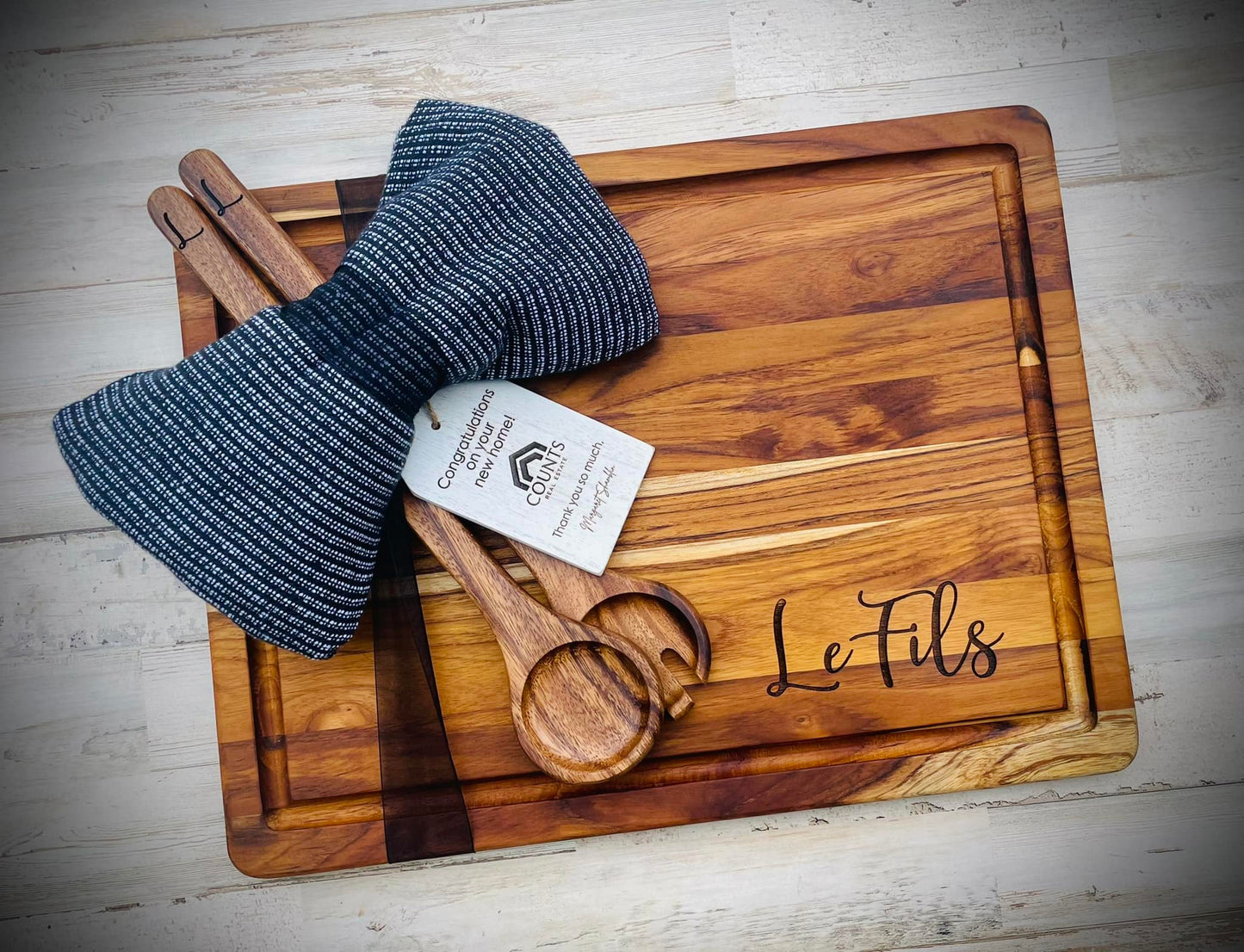 Teak cutting board with juice grooves